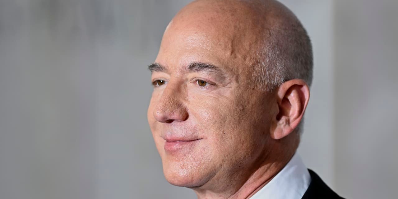 Jeff Bezos overtakes Elon Musk as world’s richest person, as Tesla stock slides